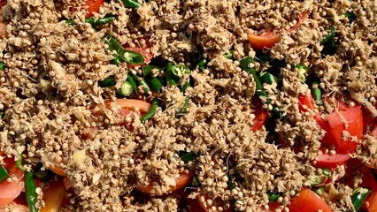 A colorful mix of spices beautifully arranged on a plate, showcasing vibrant hues, rich textures, and the aromatic essence of culinary tradition and flavor