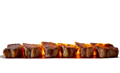 A series of steaks placed on a hot grill with flames licking the sides of the meat, creating a mouth-watering scene of sizzling food against a crisp white backdrop