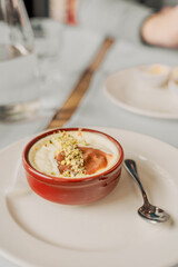 Syutlach. A creamy dessert with a golden crust, baked in clay molds in the oven.