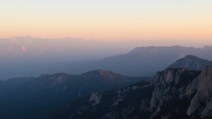 Obraz premium Serene Mountain Landscape at Dusk with Multicolored Sky and Peaks