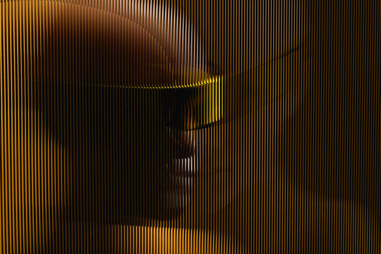 Futuristic head with virtual glasses behind frosted glass