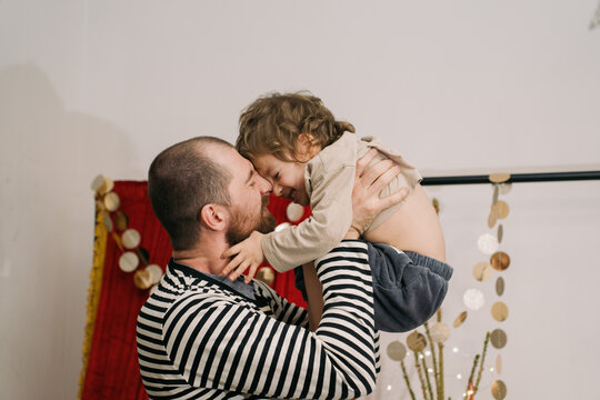 Father And Son Spend Time Together At Christmas