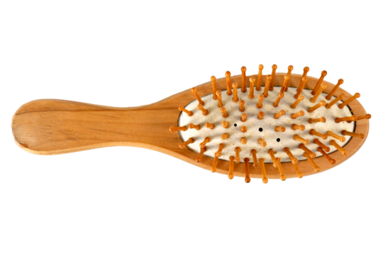 Wooden hair comb hair brush on white background isolated top view