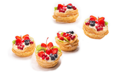Home made cake with cream and fruits isolated.