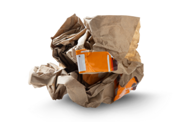 Crumpled paper fast food bag isolated on transparent background