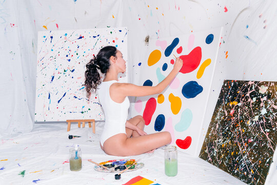 Creative artist painting in art studio