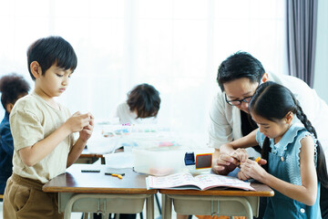 Group of diverse children enjoy learning about the STEM.