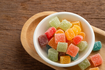 Fruit jelly candy sugar coated in white plate.