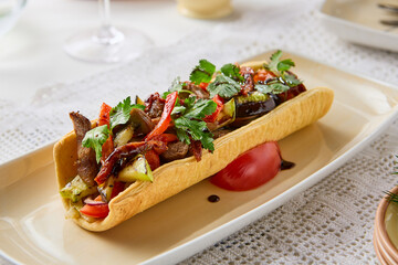 Warm Veal Salad in Lavash Vibrant Colors and Artistic Culinary Presentation