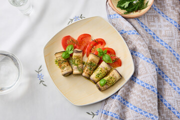 Appetizing Eggplant Rolls with Cheese on Rustic Plate Bright Natural Light and Earthy Textures
