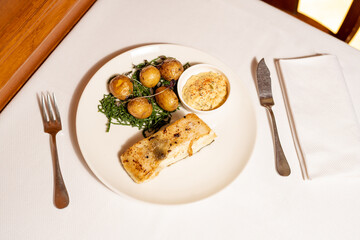 Fish Dish with Potatoes and Sauce