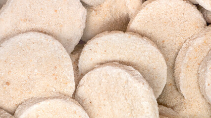 Frozen round fish cutlets close -up in freezer, Fish semi -finished products for quick cooking