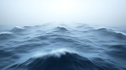 Fototapeta premium Rolling Ocean Waves Under a Misty Sky