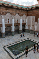 Madrassa Ben Youssef, 16th century university building with prayer room and decorated patio with...