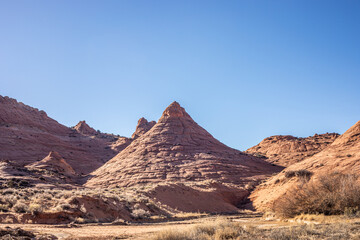 Conical Rock Formation in Desert Landscape