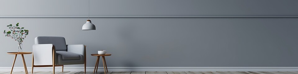 Gray living room featuring minimalist armchair, side table, hanging lamp, and empty wall background. Ideal for presentations.
