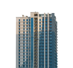 Modern high-rise residential building with sleek concrete facade, contemporary urban development in...