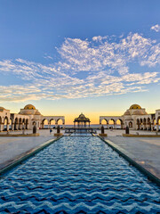 fountain and center of the promenade of the seaside resort of Sahl Hasheesh in Egypt at sunset