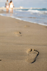 footprints on the beach