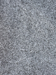 Stone or wall background from a gray concrete granite
