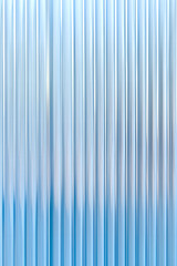 Obraz premium Abstract background with reeded ribbed glass effect texture 