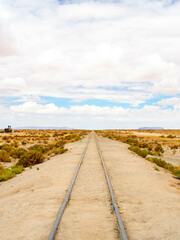 Fototapeta premium View of an abandoned train track in Uyuni desert Bolivia