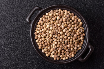 White allspice in a ceramic bowl
