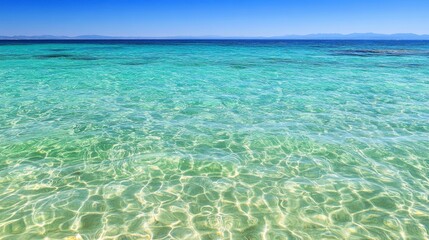 Serene Coastal Waters: A Stunning View of Azure Water and Horizon