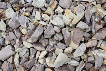 texture with small light pebbles close by