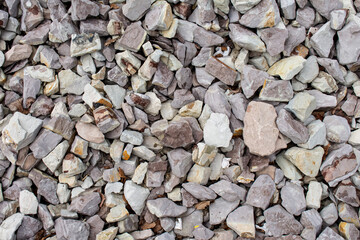 texture with small light pebbles close by