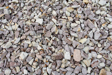 texture with small light pebbles close by