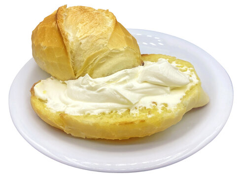 pao frances with requeijao in a white plate isolated french bread with cream cheese in a white plate