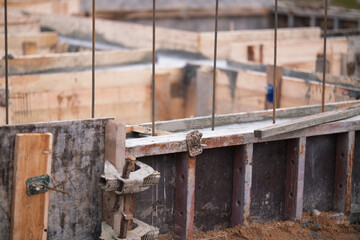 Construction of pile-grillage foundation. Monolithic foundation with metal reinforcement. Monolithic concrete foundation. House construction