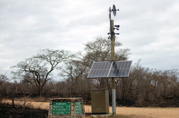 Solar powered surveillance and communication system and a signpost, Kruger national park, South...