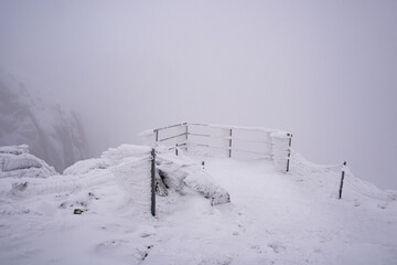 Winter Śnieżne Kotły in thick fog, Karkonosze Mountains, Poland.