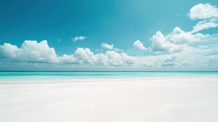Serene Tropical Beachscape: Azure Waters, White Sands, and Puffy Clouds