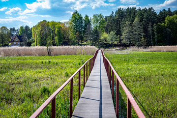 Hiking path in flooded meadows in the Zeimena valley, Svencioneliai, Lithuania