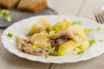 Homemade potatoes with aromatic fish