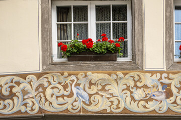 Fototapeta premium Frescoes depicting village life on the painted houses of the old town of Stein am Rhein, Canton Schaffhausen, Switzerland