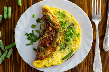 Omelette with beans and fresh herbs