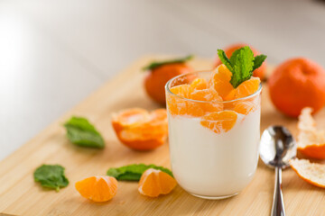 Refreshing dessert with tangerines and yogurt