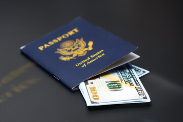 USA passport with cash, symbolizing finance, travel, and citizenship United State of American.