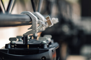 Professional stage lighting rig being assembled for a concert
