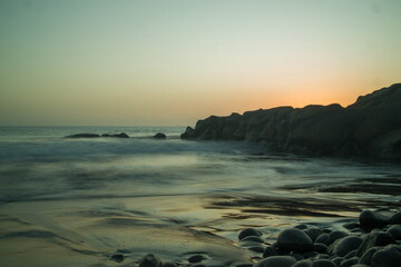 Rocky beach in Gran Canaria at sunset, sunrise.