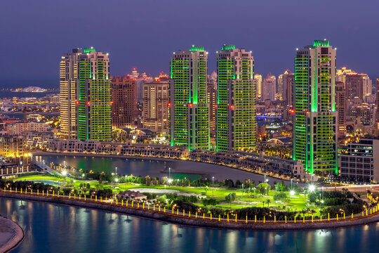 Doha, Qatar - January 10, 2025: Aerial view of pearl Qatar `porto arabia Gewan island with UDC tower