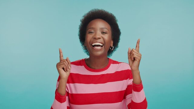 Dance pointing and face of black woman in studio for retail option, shopping budget plan and decision. Excited, mockup space and customer with person on blue background for discount code solution