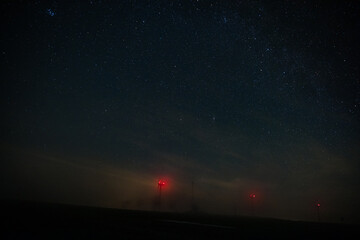 Wind power plant without light polution and sky full of the stars between villages Vendoli and Ostry Kamen, Czech republic