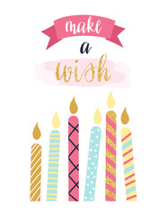 Colorful birthday candles glowing brightly, surrounded by a pink ribbon banner displaying the words Make a Wish, creating a joyful atmosphere for a festive celebration