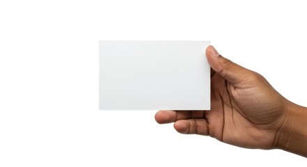 Obraz premium A hand holding a blank white card in a neutral setting isolated on a white background