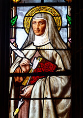 Obraz premium Stained glass (19th century) of Saint Teresa of Avila or Sainte Thérèse d'Avila. Saint of the Roman Catholic Church.
